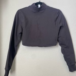 Black long sleeve cropped open back Lululemon top - size 4